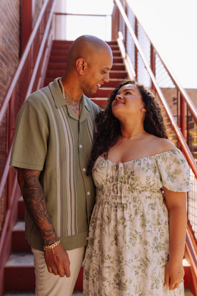 Couple laughing together during a Downtown Ocala engagement session