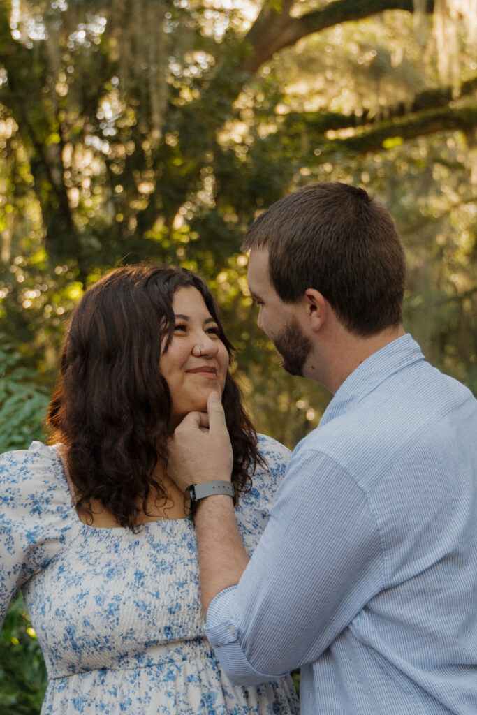 Romantic couple portrait with warm golden light at Sholom Park