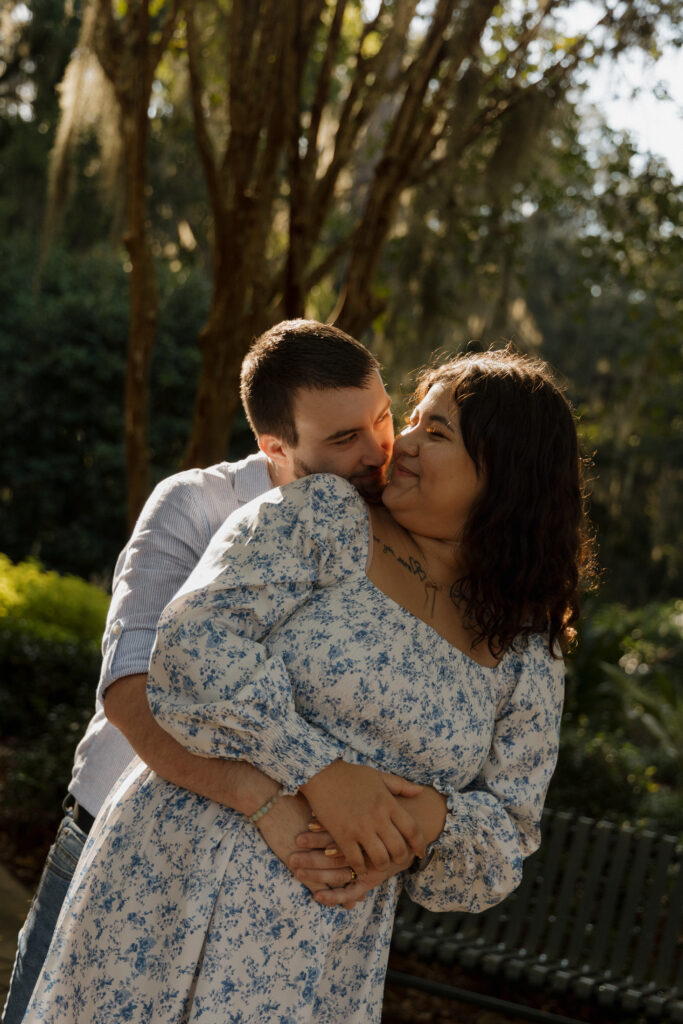 Romantic couple portrait with warm golden light at Sholom Park