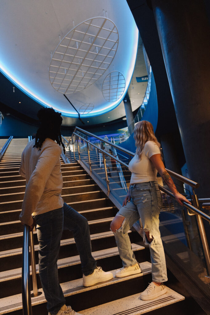 A couple explores the exhibits at Mote Marine Laboratory & Aquarium in Sarasota, Florida.