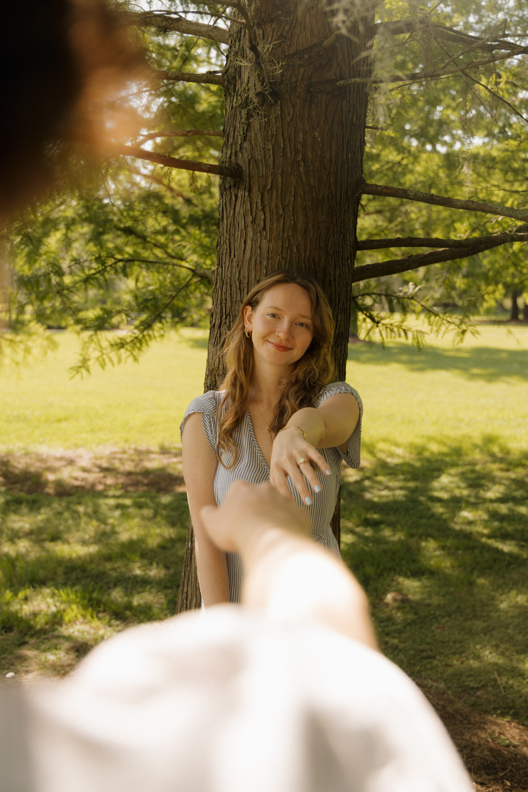 Future bride showing her engagement ring during a Sholom Park engagement session in Ocala Florida